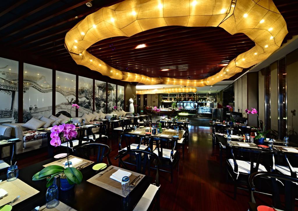 Vienna International Hotel Suzhou University Town Exterior photo