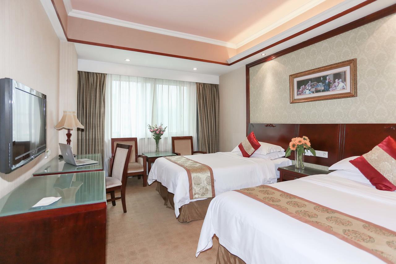 Vienna International Hotel Suzhou University Town Exterior photo