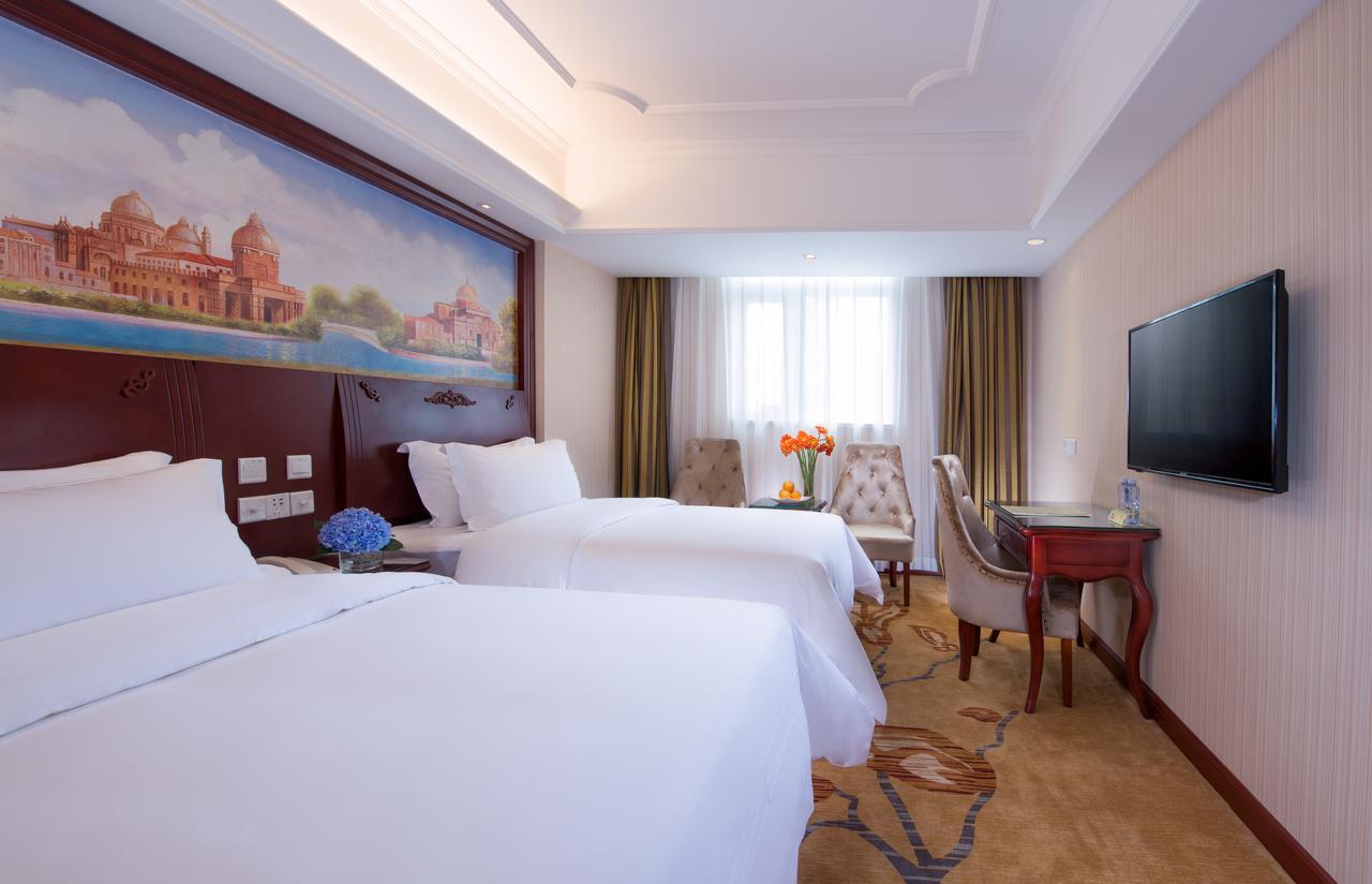 Vienna International Hotel Suzhou University Town Exterior photo